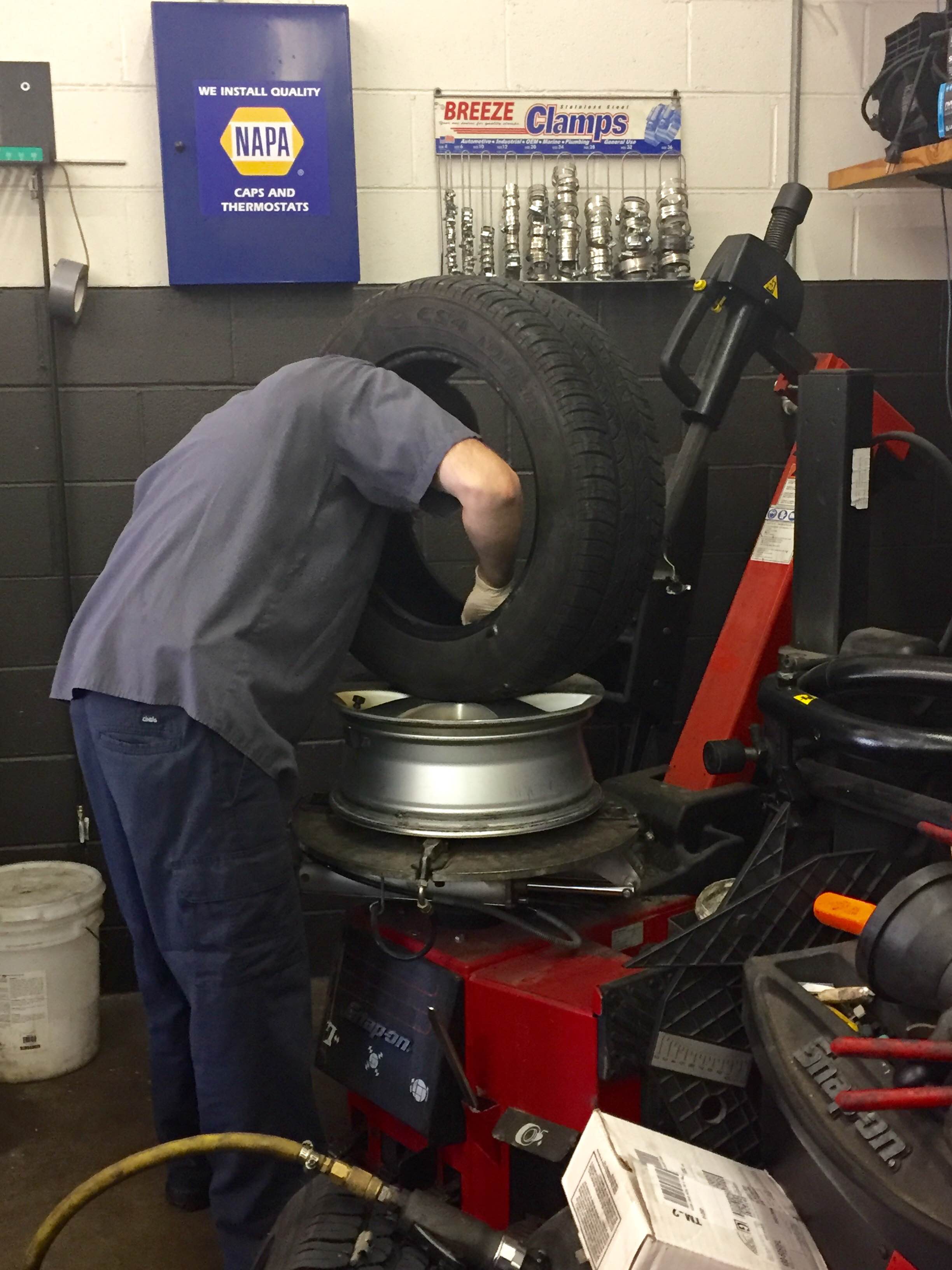Auto Experts Inspecting Tires at Schmidt Auto Care